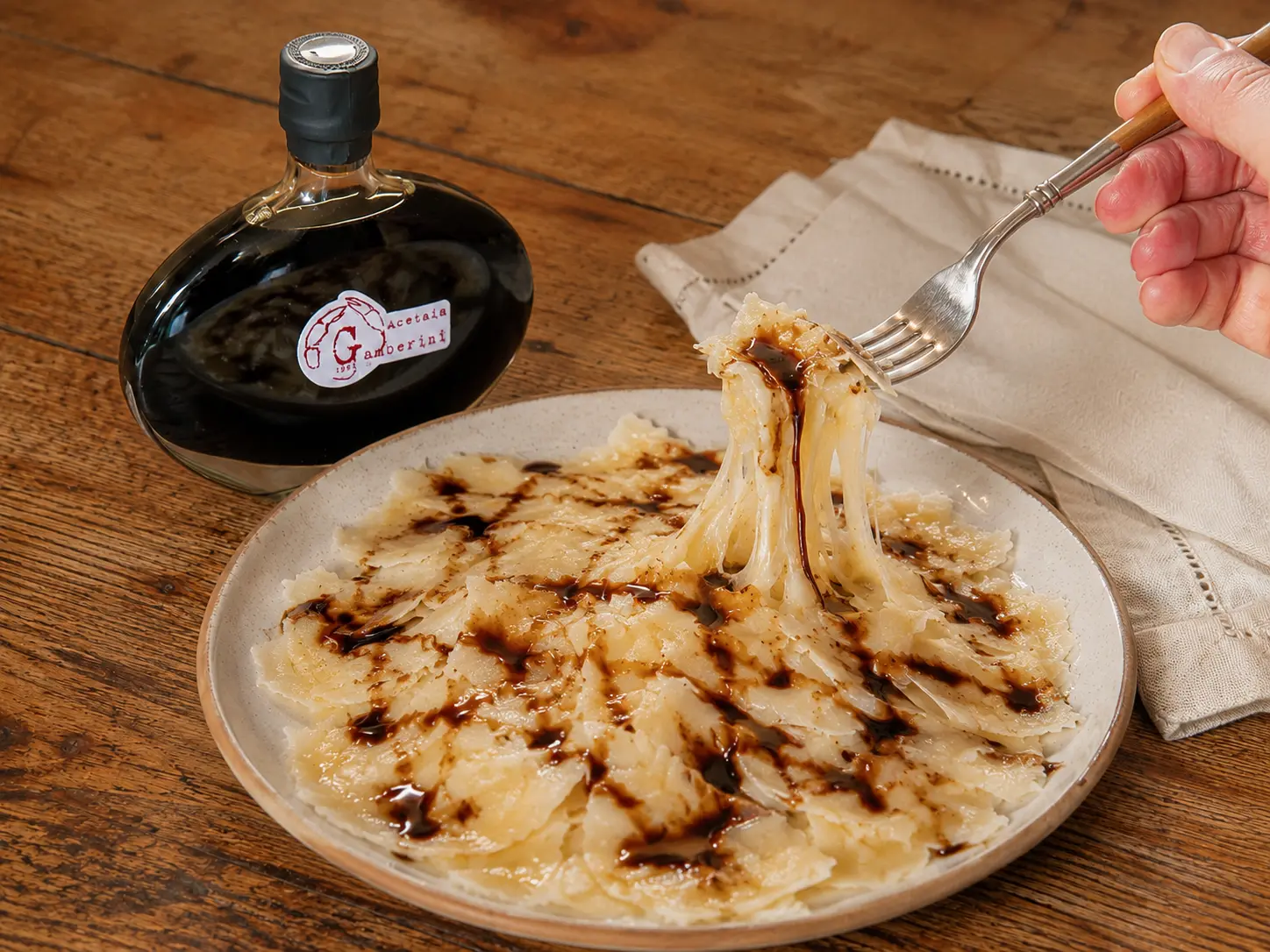 Parmigiano Reggiano fuso con Aceto Balsamico Gamberini 25 anni